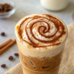 Cinnamon Iced Latte with cinnamon stick and iced espresso
