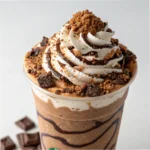 mocha cookie crumble frappuccino with whipped cream and cookie topping
